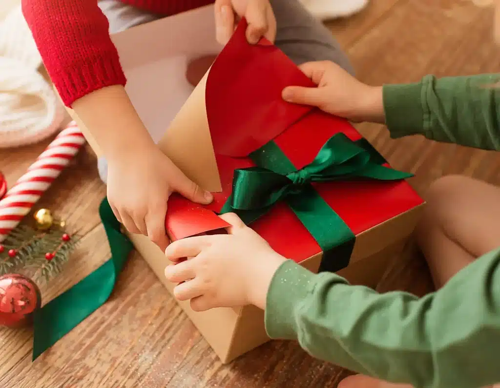 Kids open their presents on Christmas morning